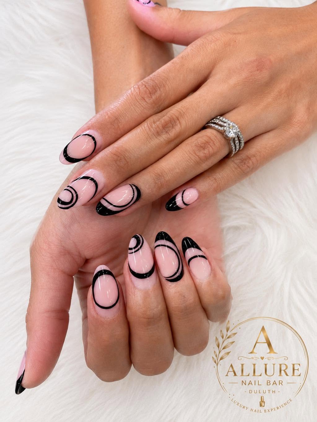 Nude nails with black swirl outline nail art at Allure Nail Bar Duluth