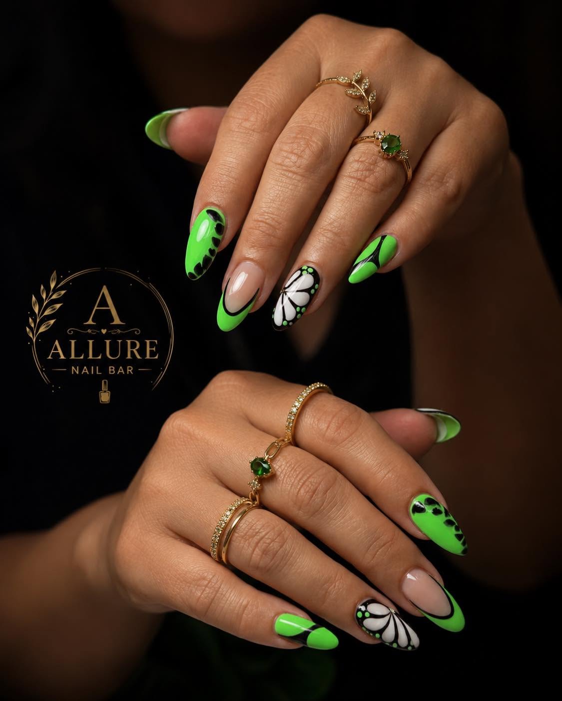 Neon green nails with black and white butterfly nail art at Allure Nail Bar Duluth